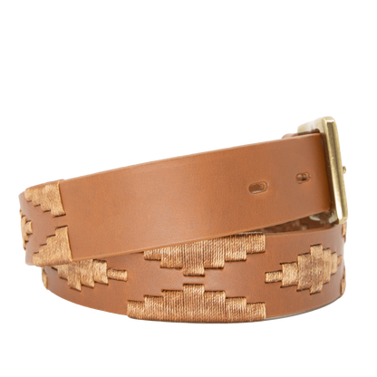 A tan leather belt with a tan woven geometric pattern and solid brass buckle.