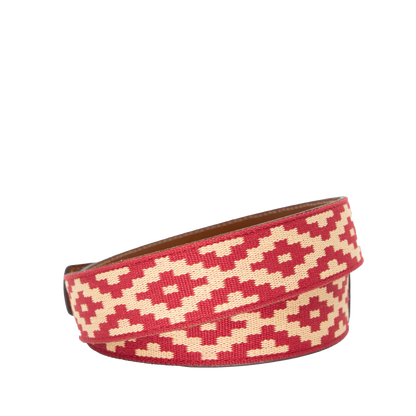 A brown leather belt with a red and beige woven geometric pattern and solid brass buckle.