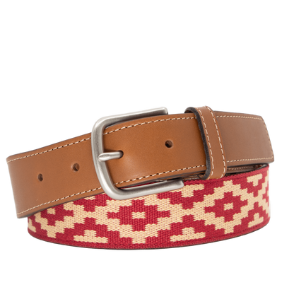 A brown leather belt with a red and beige woven geometric pattern and solid brass buckle.