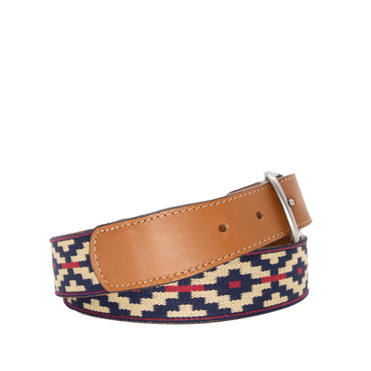 A cognac brown leather belt with a navy, kahki and red woven geometric pattern and solid brass buckle.