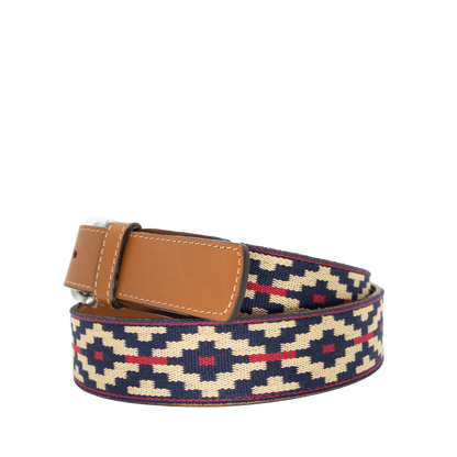 A cognac brown leather belt with a navy, kahki and red woven geometric pattern and solid brass buckle.