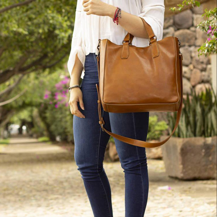 Woman carrying Mission-Mercantile-Leather-Goods-Ellington-Leather-Market-Tote-w-Zippered-Pouch-MM-EL